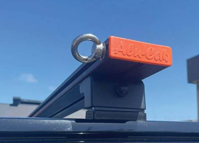 Alu-Cab Load bars Caps in Orange Right Side